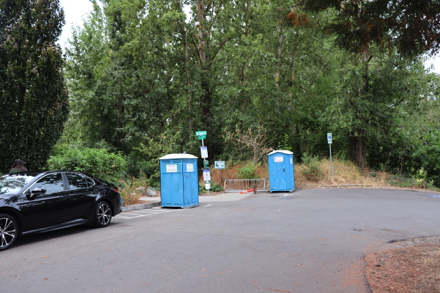 Street parking only – one ADA street parking space – two porta potties and bike rack at entrance